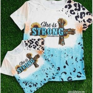 Light blue girl's blouse with leopard print