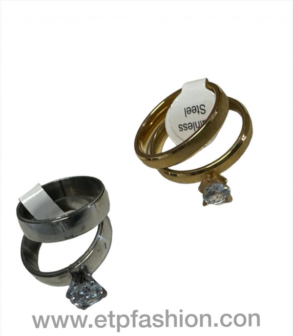 Set of women's silver and gold engagement rings